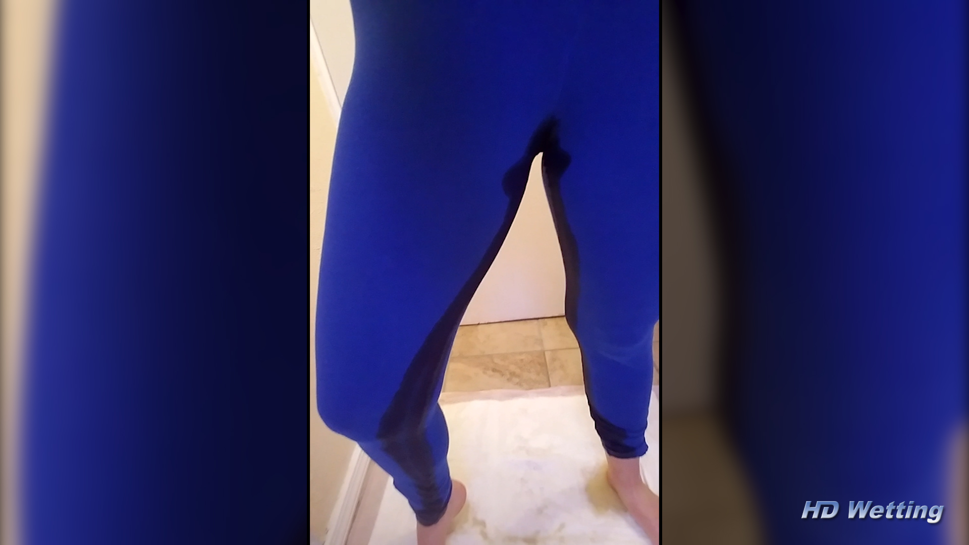 phone-5 Really soaking her leggings now, visible pee stream running down her legs to the floor