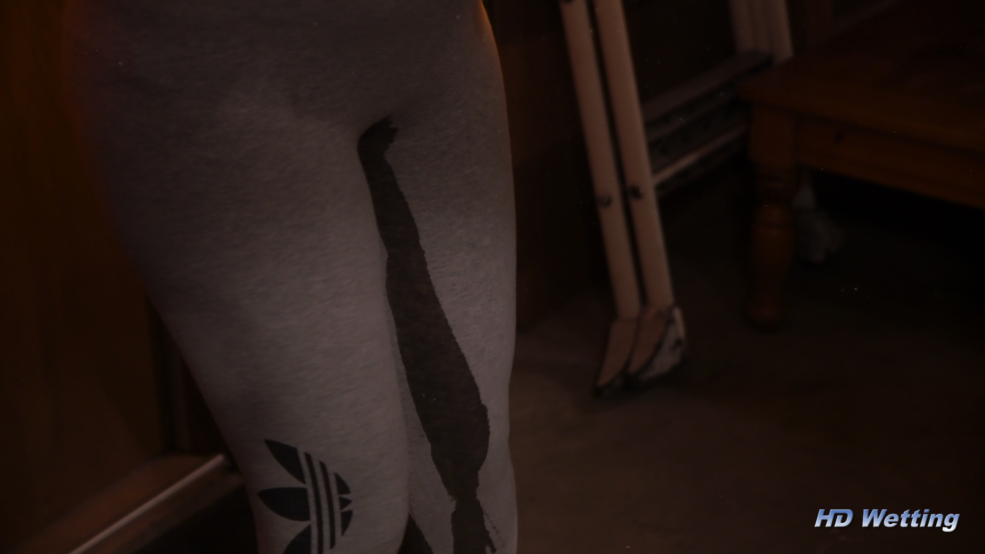 basement-5 A visible wet stream down Alisha's leg as she pees herself