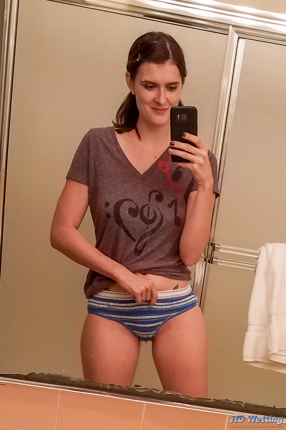 selfies-113850 Peeing in her panties while she takes a selfie