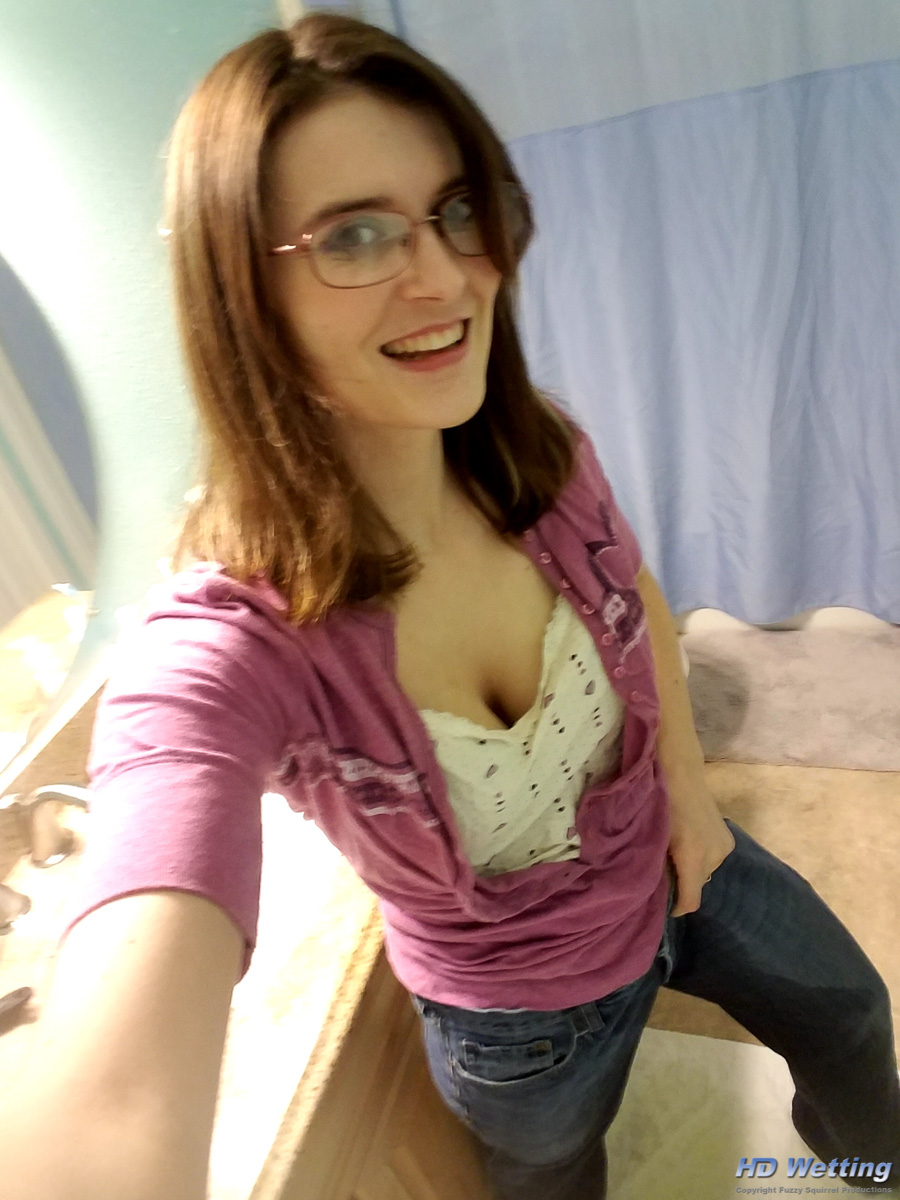 bathroom-172015 Sosha poses, showing off the jeans she just peed in