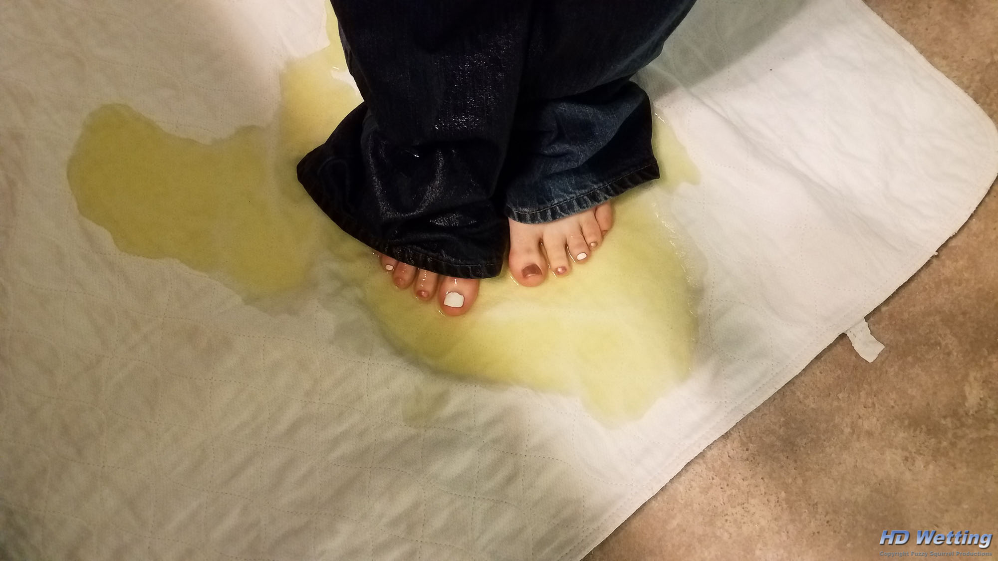 gallery_141 Sosha's bare feet standing in her pee puddle, still wearing her wet pants.