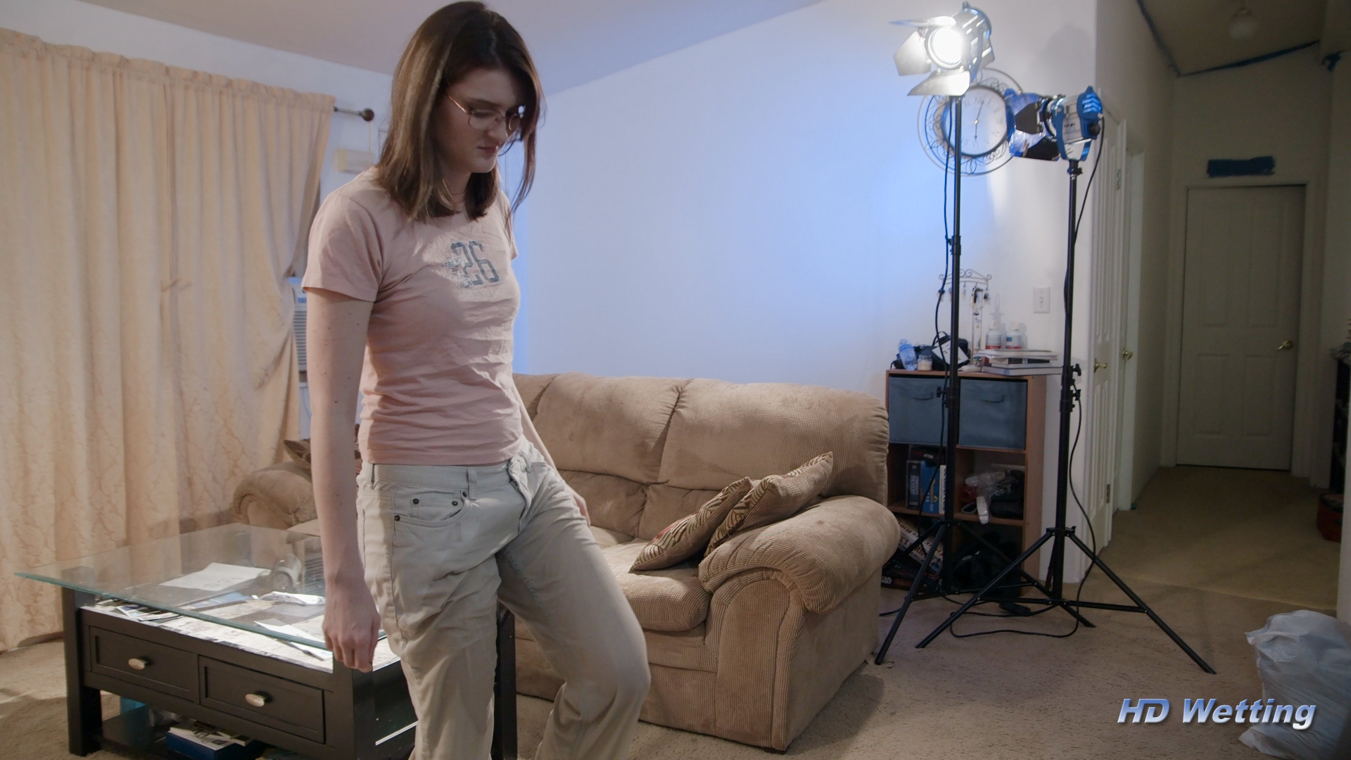 bursting-7 Sosha stands in the middle of the room, her pants soaked after peeing herself