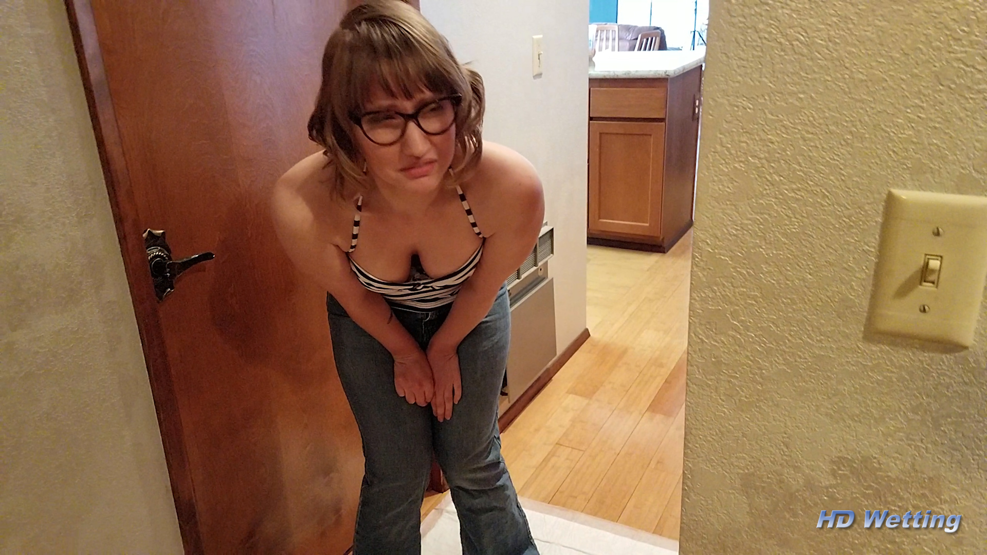 lyra-4 Lyra bends over and holds her crotch, desperate to pee.