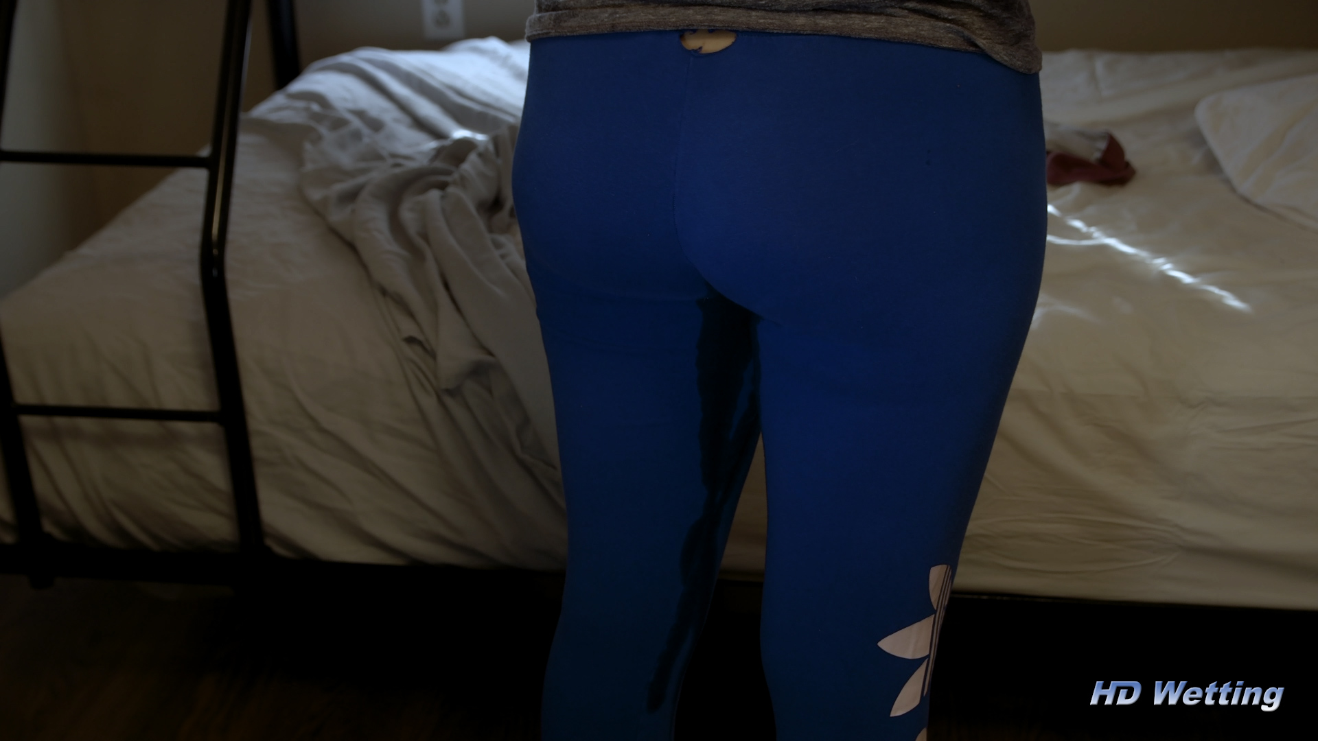 bunk-4 Close up of Alisha starting to pee in her leggings.
