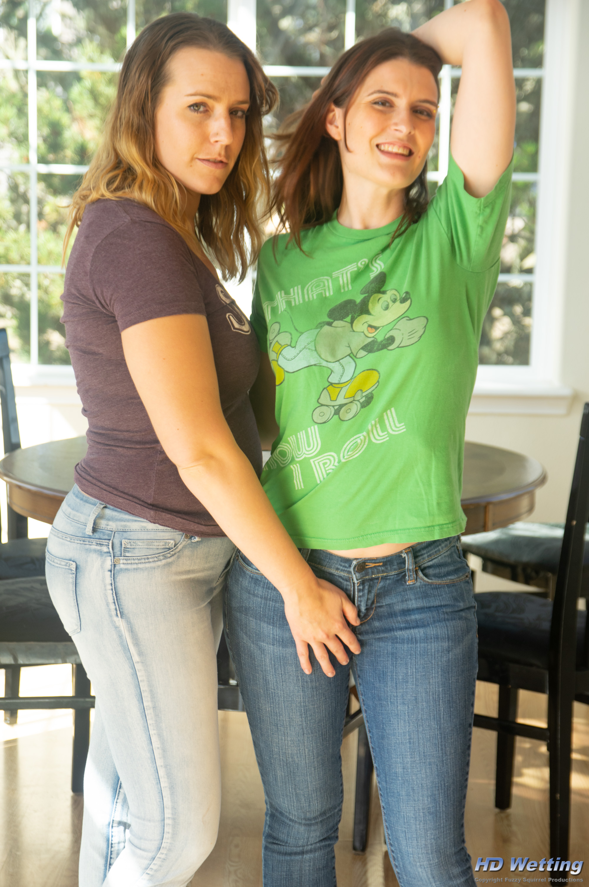jeans-9488 Alisha and Sosha pose together in jeans and t-shirts.