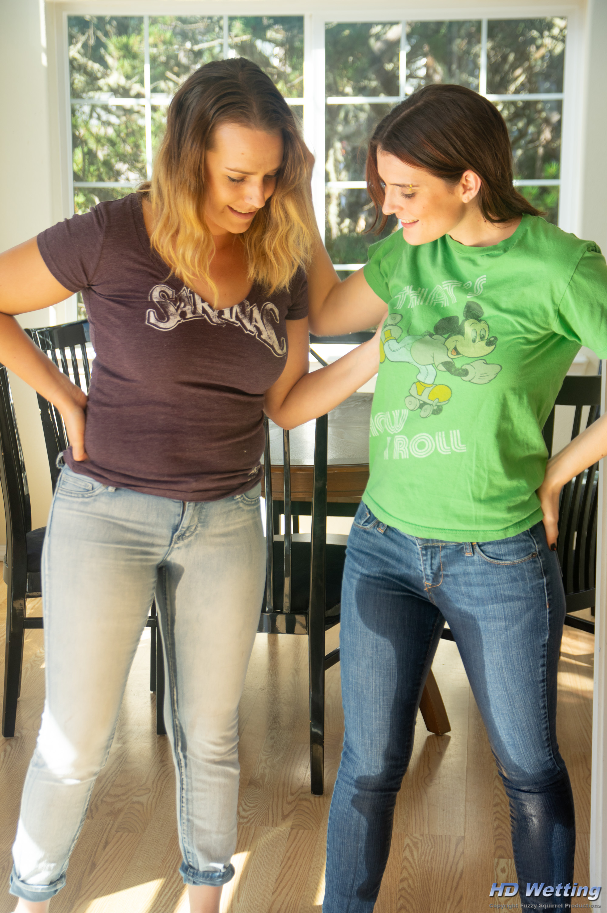 jeans-9592 Alisha and Sosha look at each other's wet jeans.