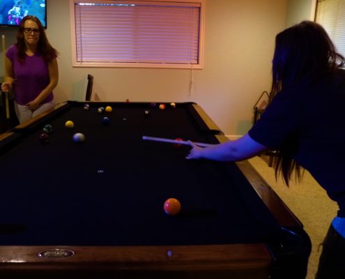 Playing pool while desperate to pee