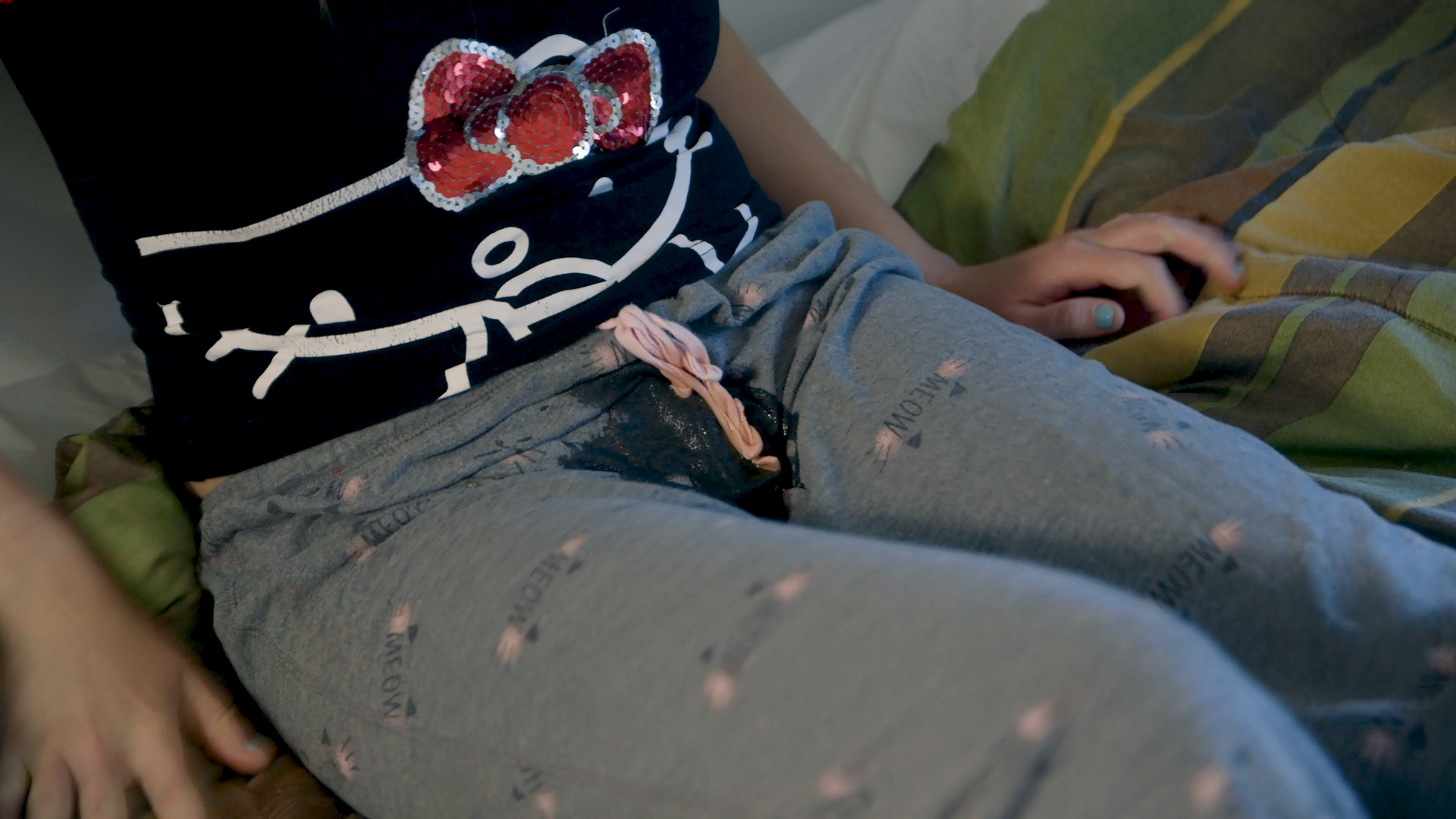 pajama-3 Starting to pee in her pajama pants.