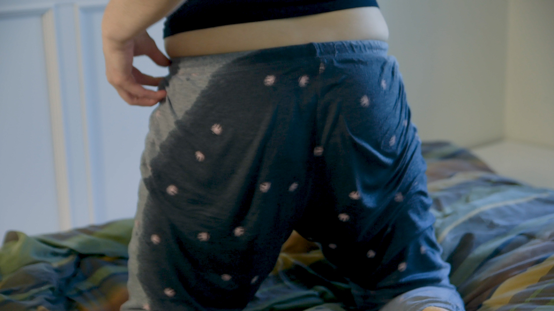 pajama-6 The back of her pajama pants are soaked with pee.
