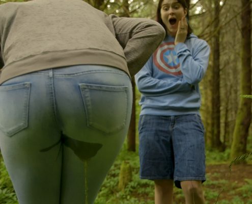 Sosha can't believe what she is seeing as Alisha pees in her pants.