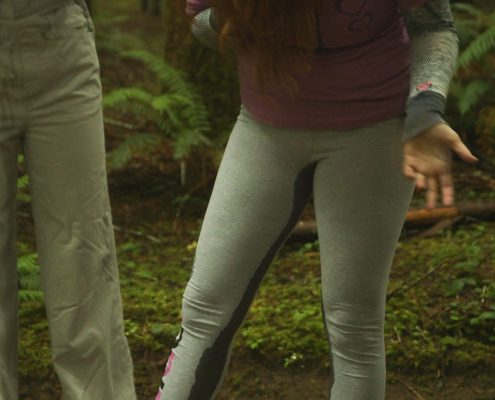 Alisha shows off her wet leggings after she pees in them