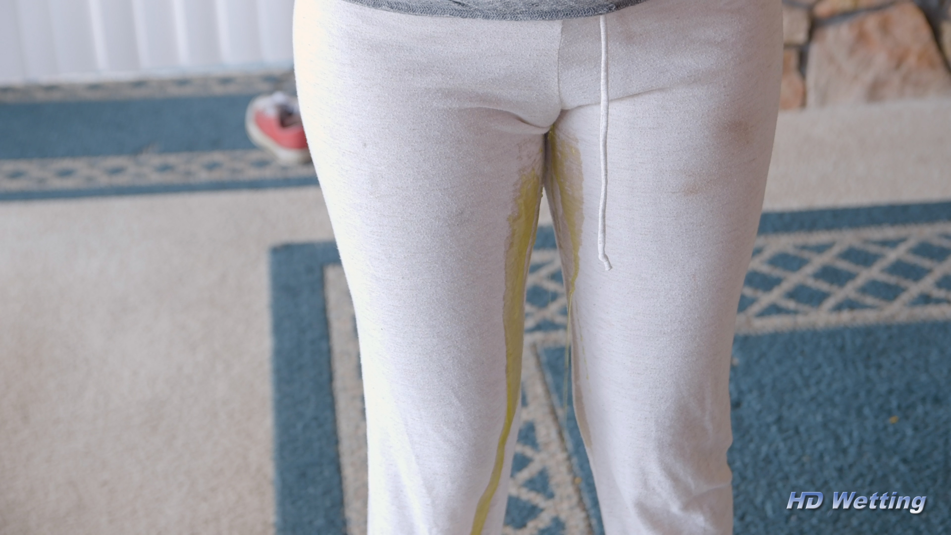 white-4 Visible yellow streams are visible cascading down Alisha's legs as she wets her pants