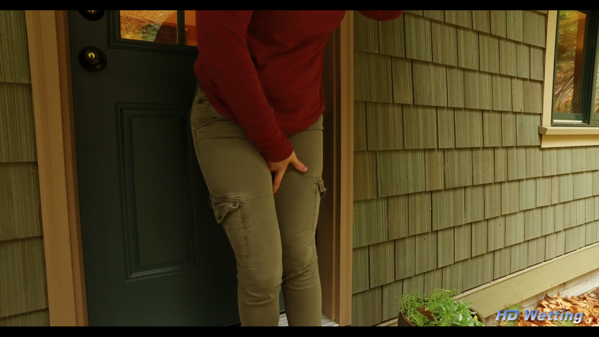 squirrel-5 Desperate to pee, Alisha presses her hands firmly into her crotch trying to hold it