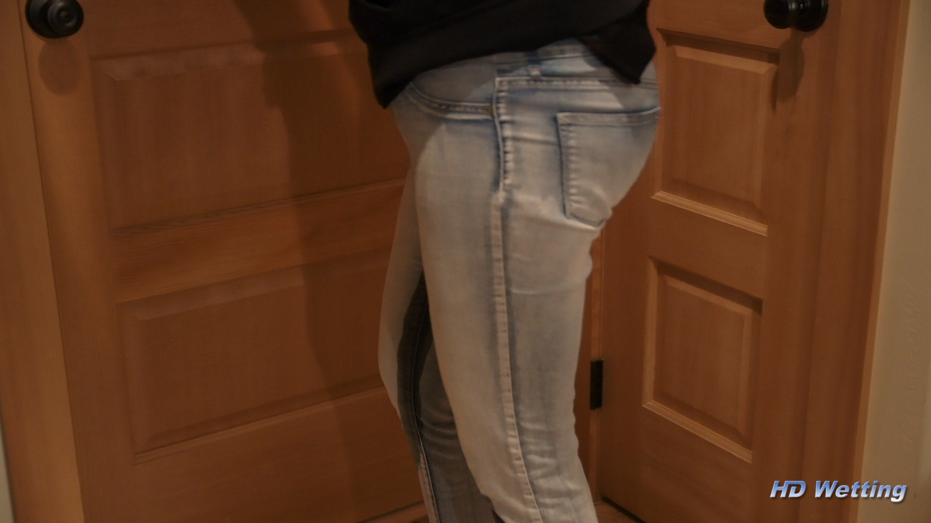 bathroom-6 Wet patche extends down her leg as she pees her pants