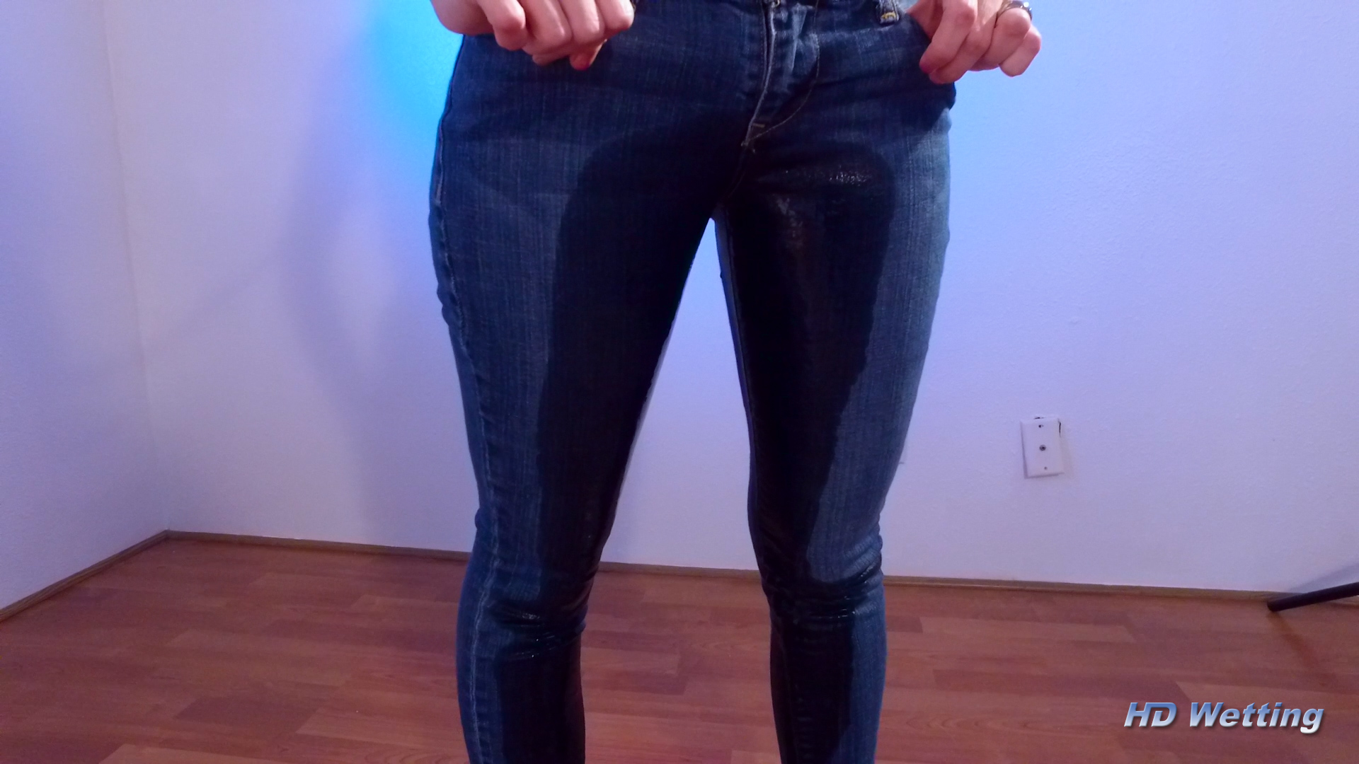 slow-8 Medium shot of the front of Sosha's pants immediately after she peed in them