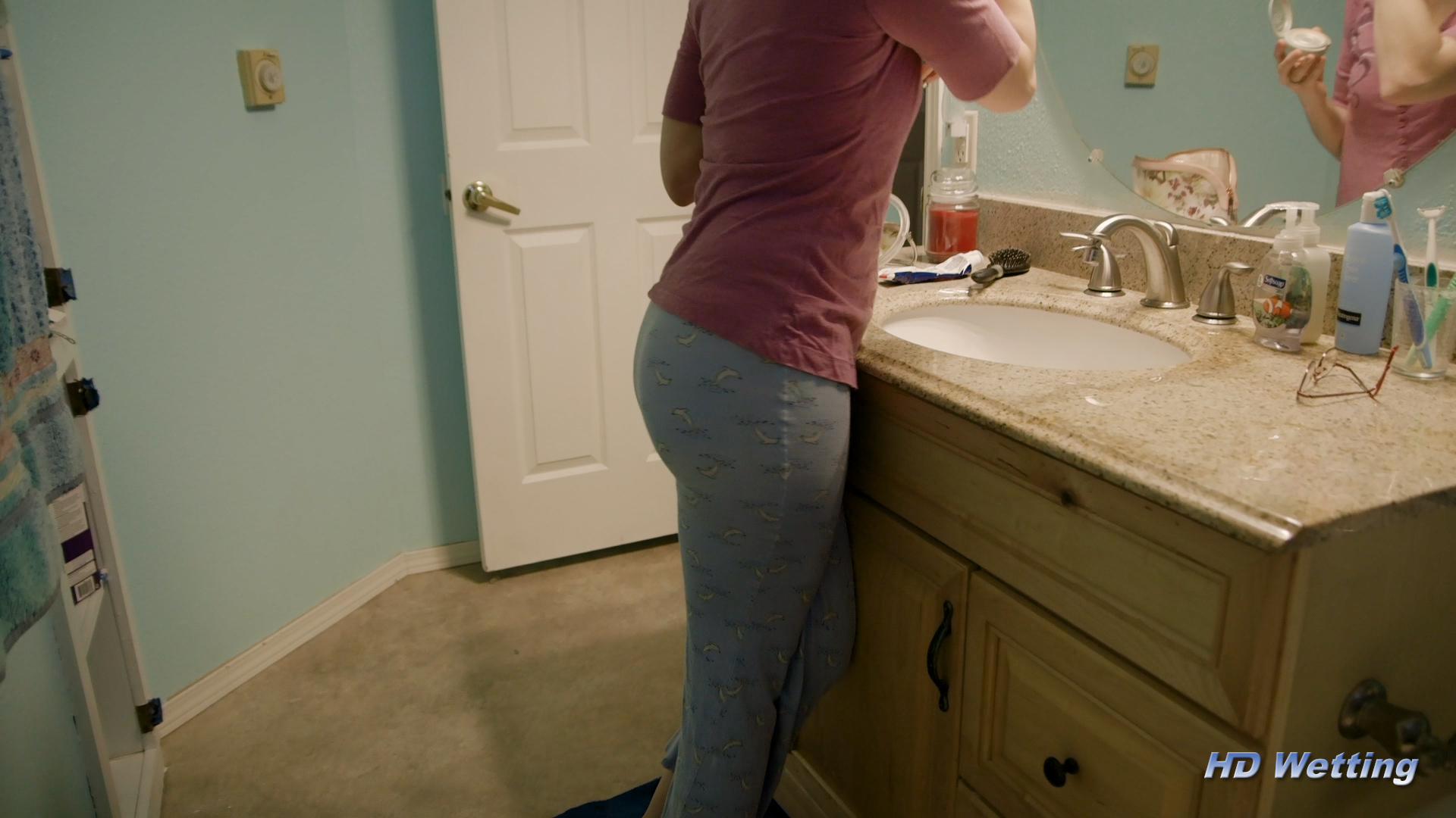 pajamas-3 Crossing her legs needing to pee.