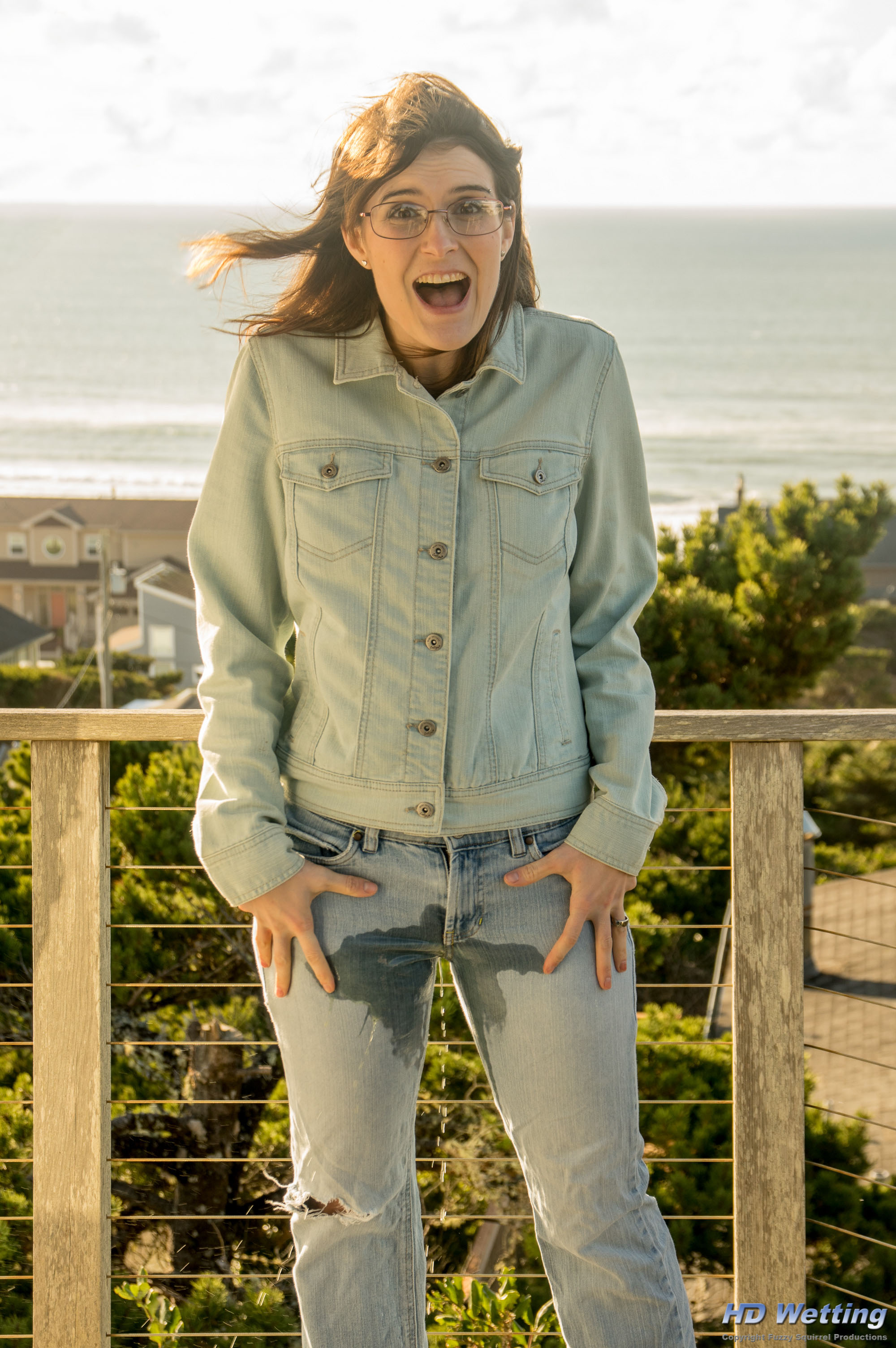denim-6437 A wet stain is visible around Sosha's crotch as she starts to pee herself.