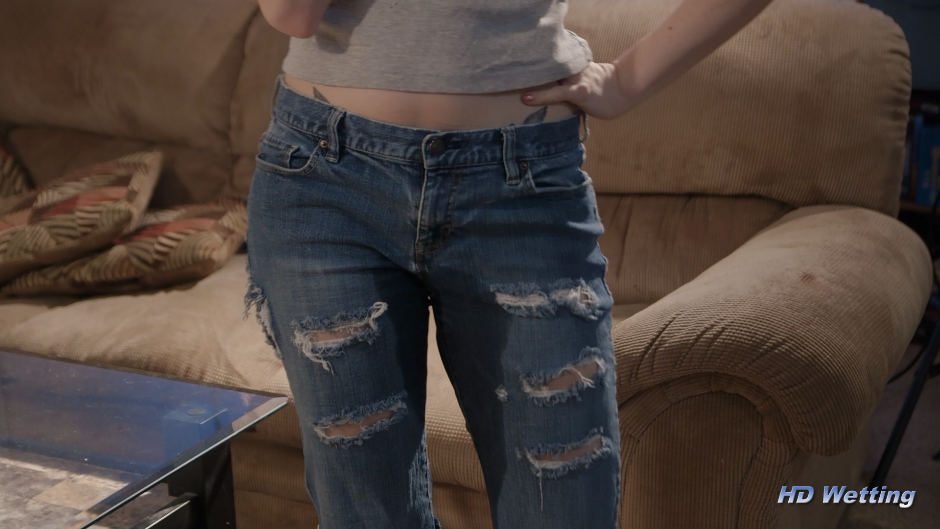 holding-10 A close up of Sosha's wet pants as she stands facing the camera.