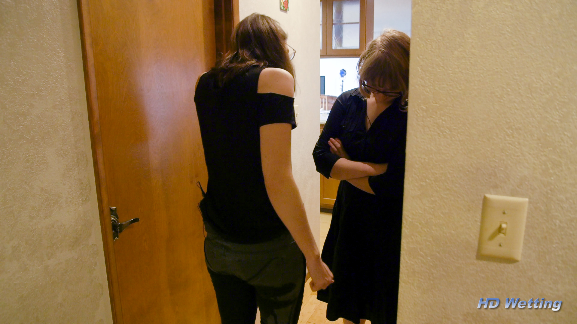 prank-10 Sosha and Lyra discuss the locked door as Sosha is still in her wet pants.