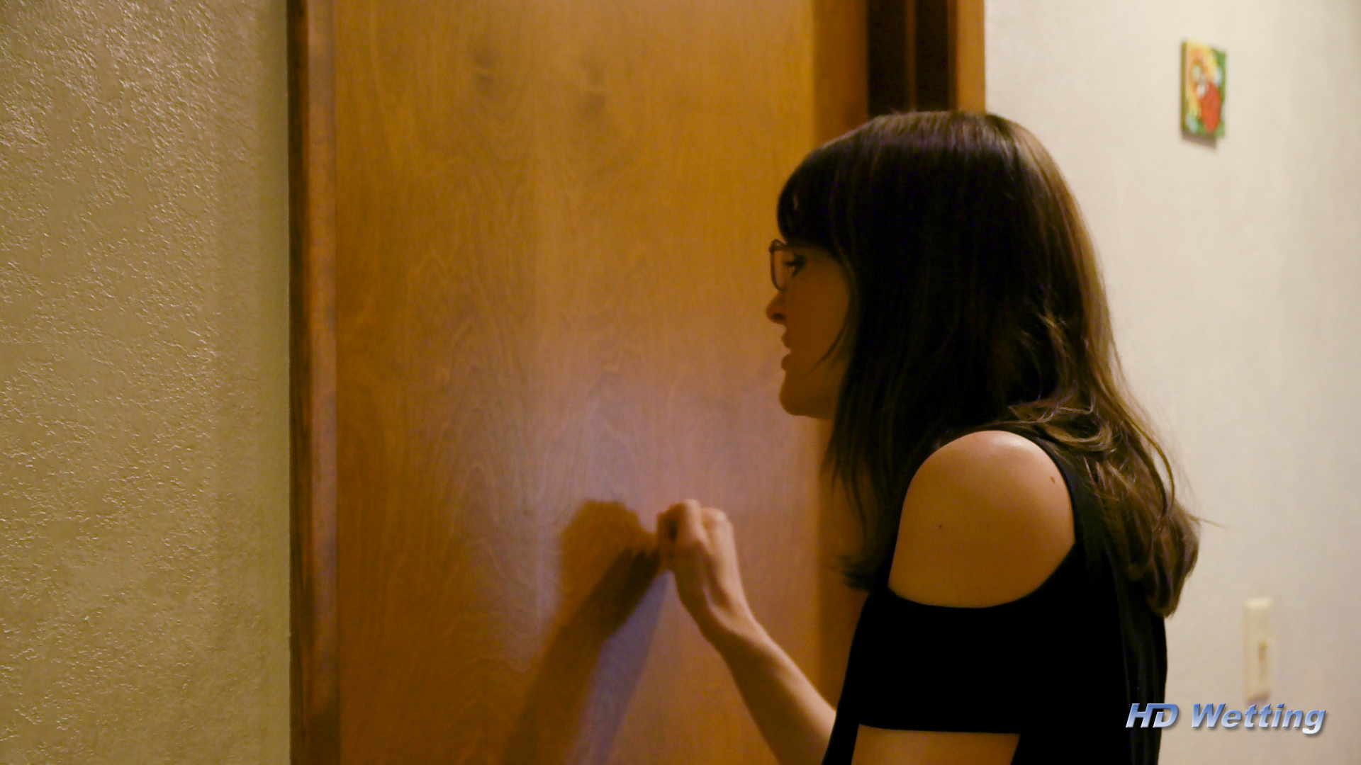 prank-3 Sosha knocks on the bathroom door, believing Lyra to be inside.