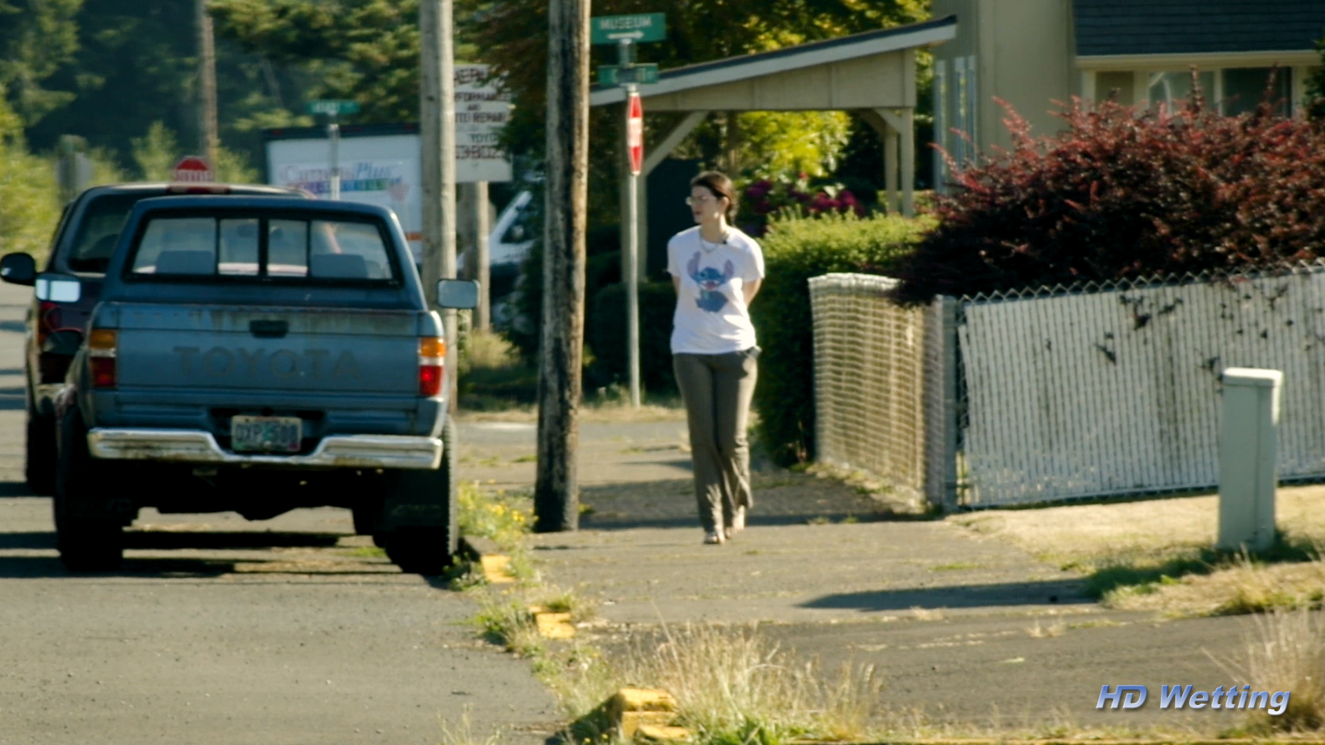 soaking-1 Sosha is walking down the sidewalk looking uncomfortable.