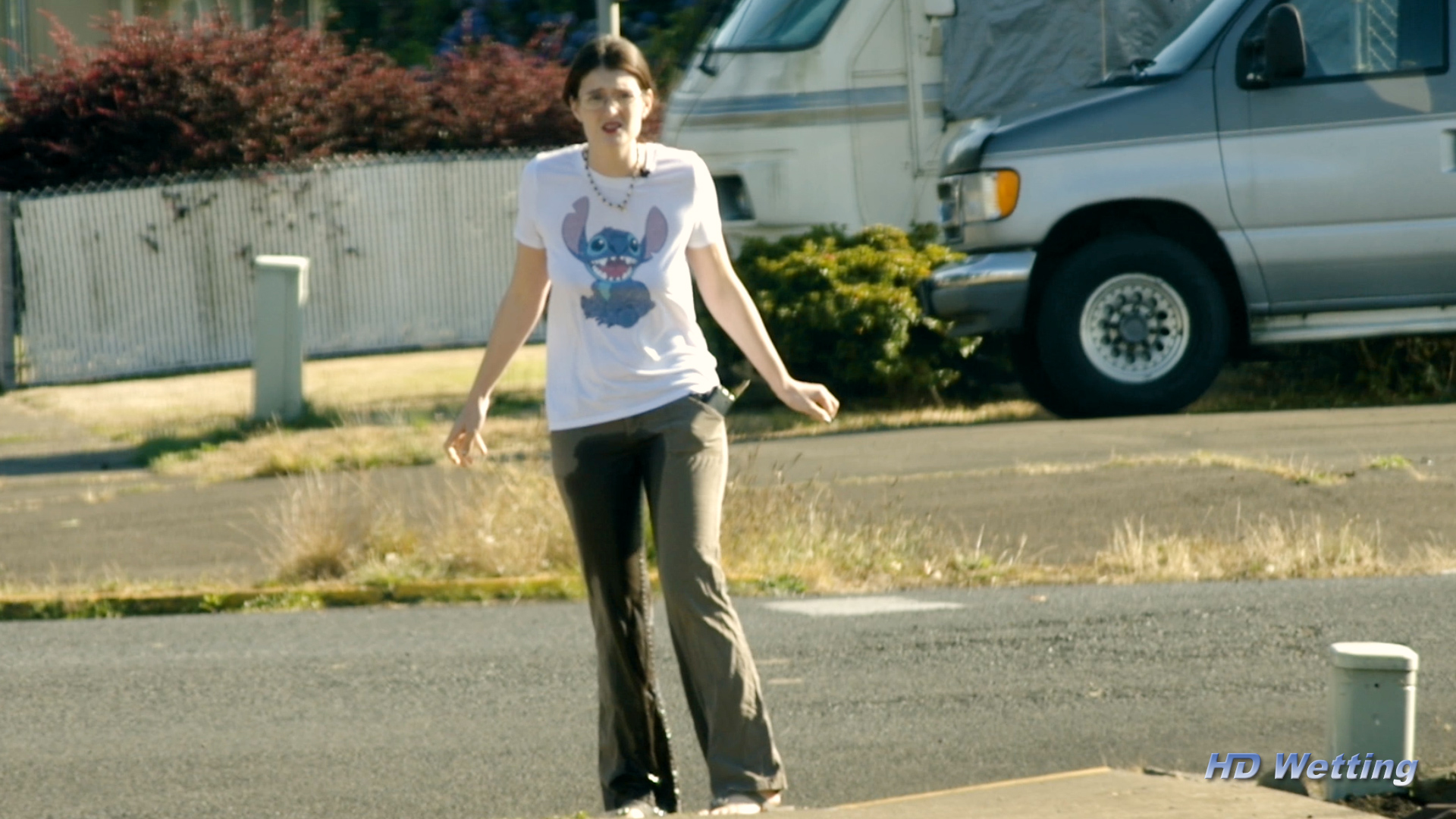 soaking-8 Sosha looks humiliated as she stands on the sidewalk in soaked pants.