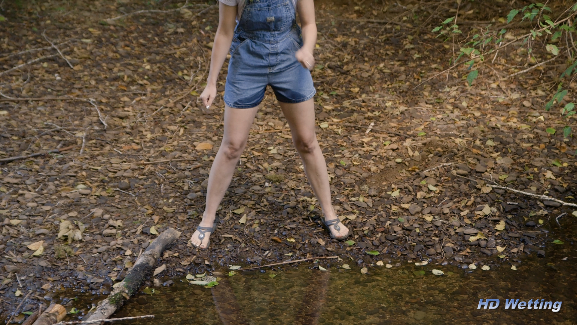 creek-6 Close up of Sosha's wet overalls as pee runs down her legs.