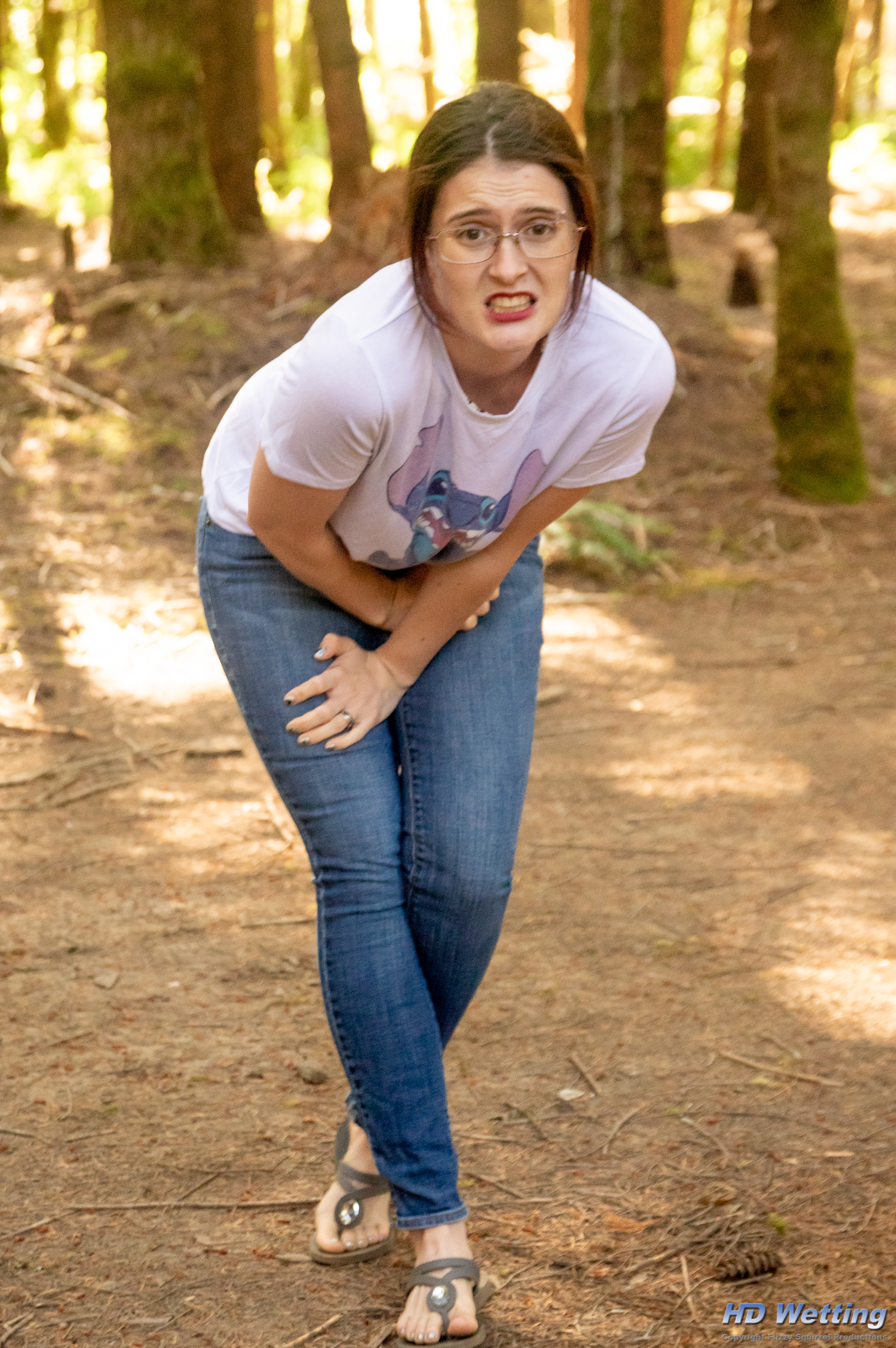 jeans-8487 Sosha is crossing her legs and pressing her hands into her crotch, desperate to pee.