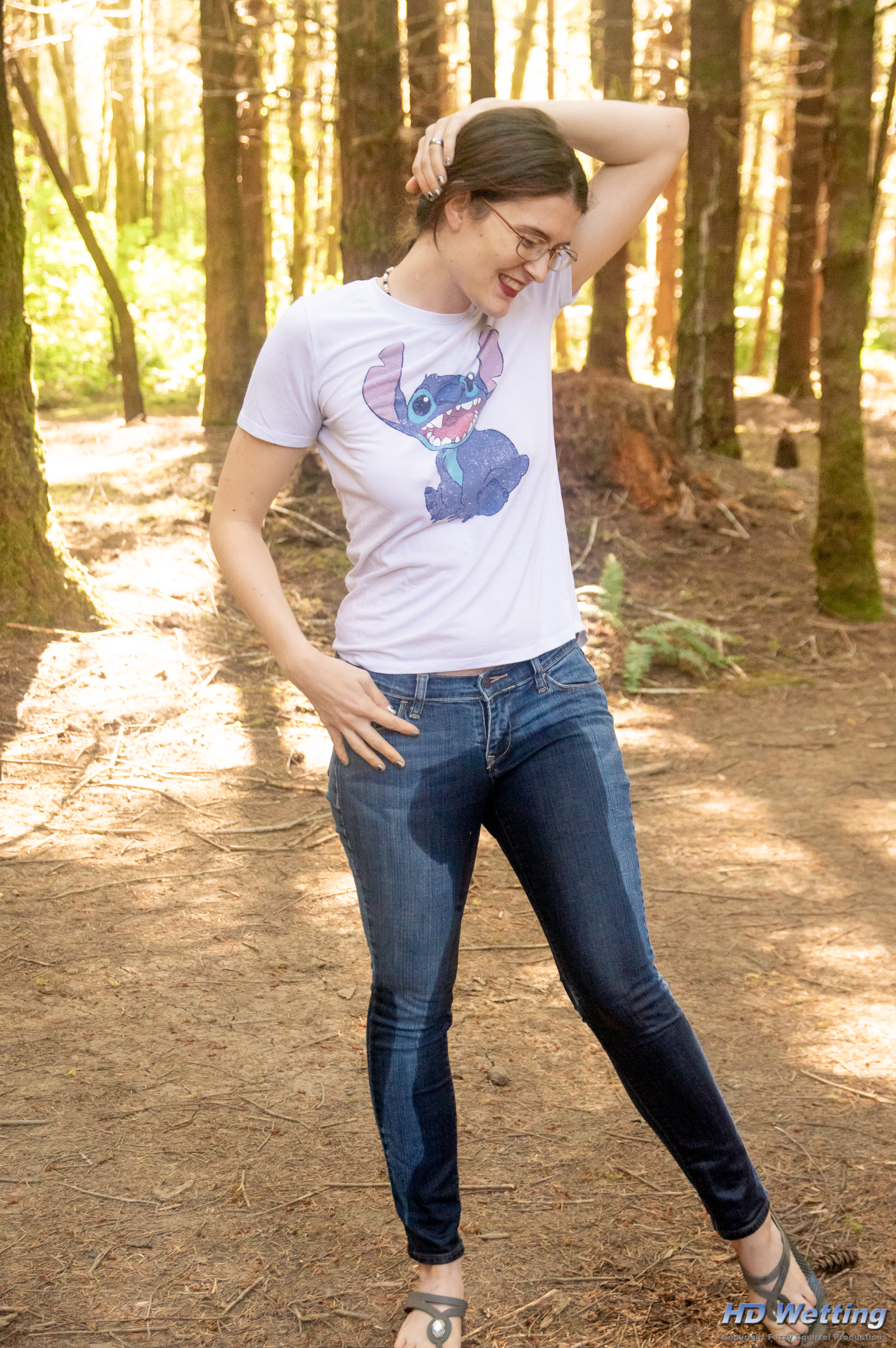 jeans-8538 Standing outside in the forest in soaking wet jeans.