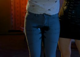 Close up of Alisha peeing in her pants.