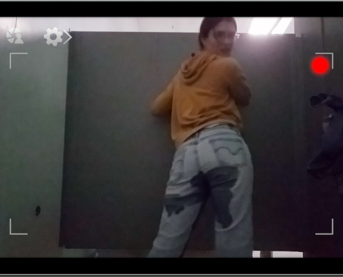 Sosha shows off the jeans she just peed in.
