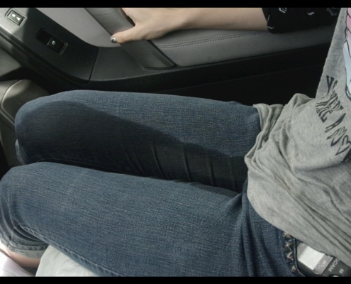 Close-up of Sosha wearing her wet jeans.