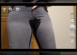 Close-up as Alisha starts to pee in her pants.