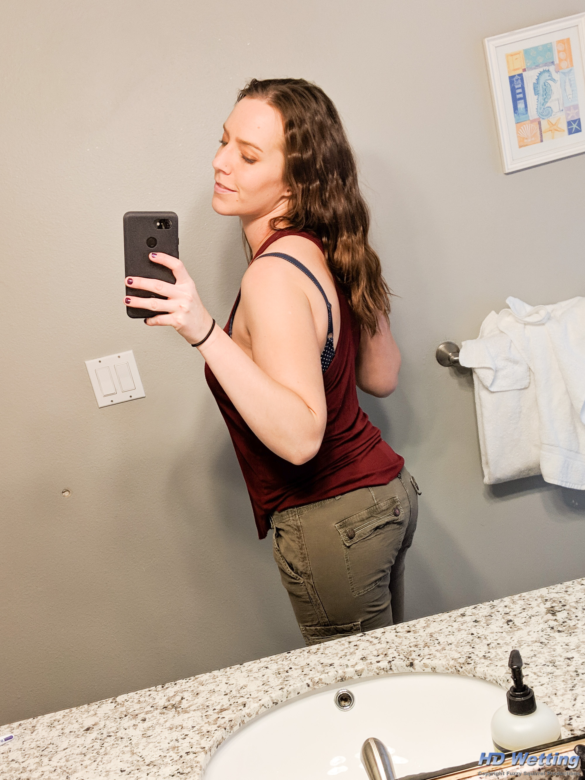 selfies-105320 A profile selfie in the bathroom mirror of Alisha.