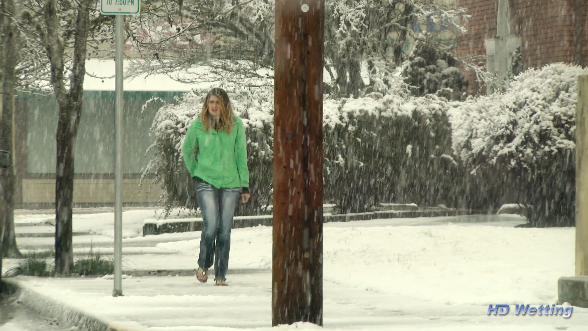snow-2 Wearing a green coat and jeans, Sosha is desperate to pee as she walks through the snow.