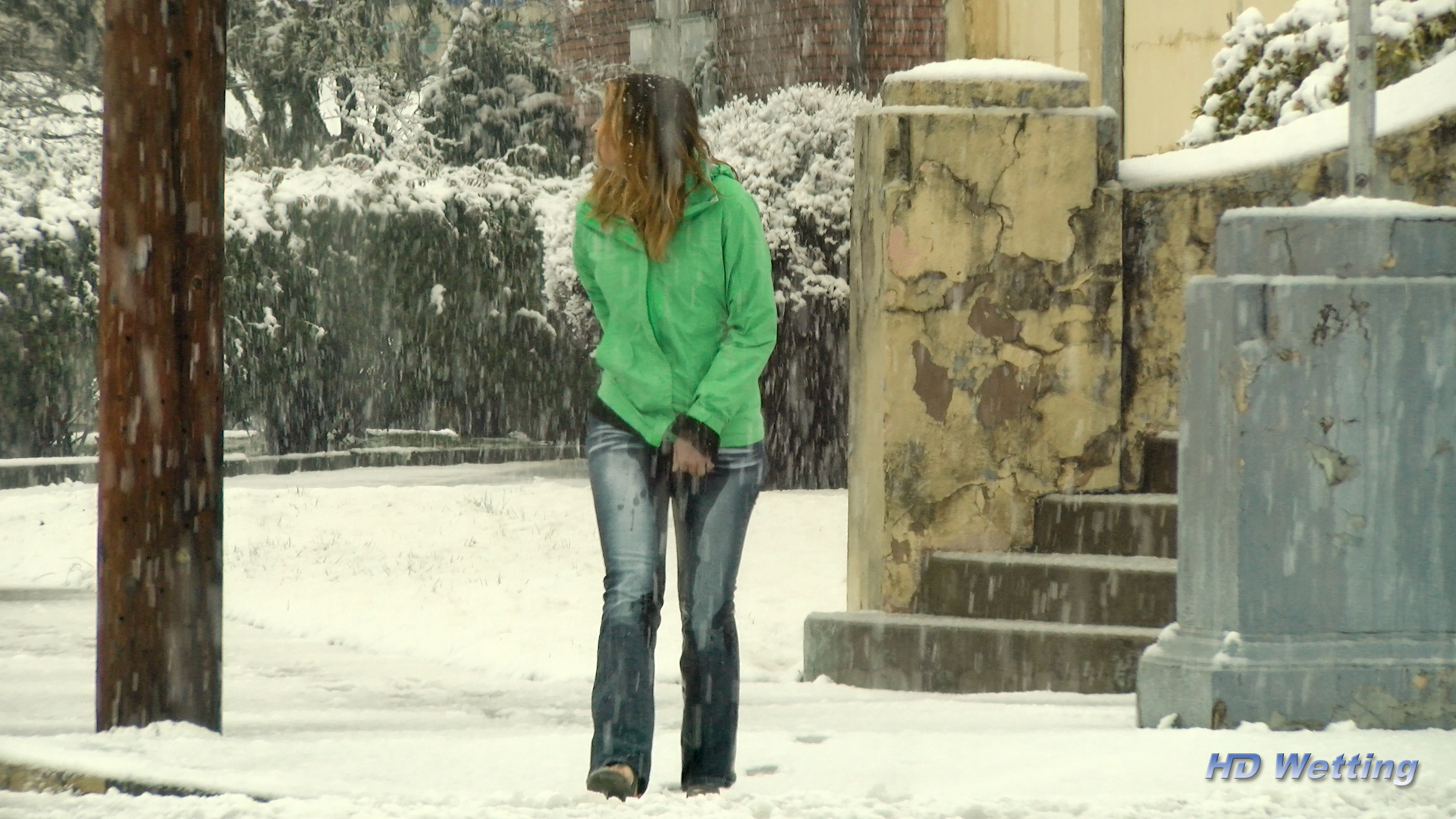 snow-4 Sosha's jeans grow visibly wet as she starts to pee herself.