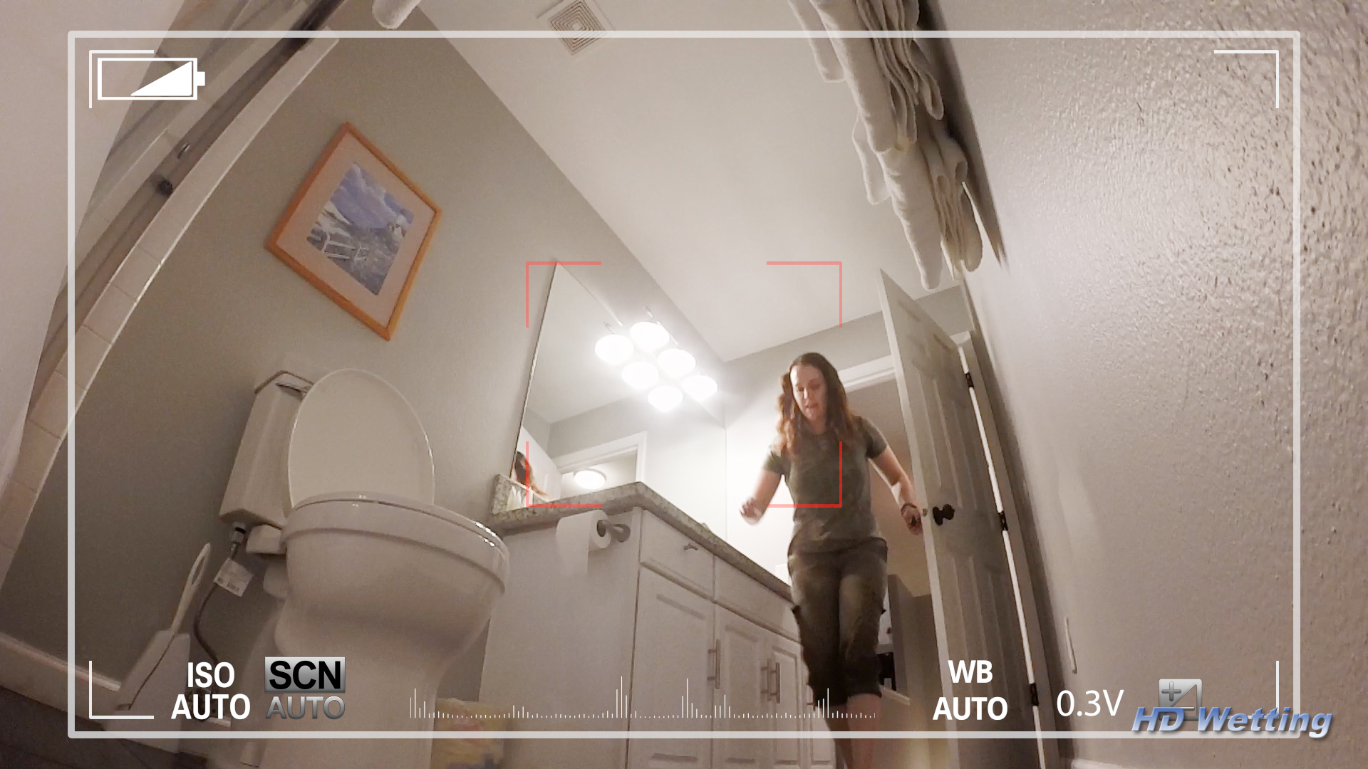 spy-1 Alisha bursts into the bathroom and races to the toilet.