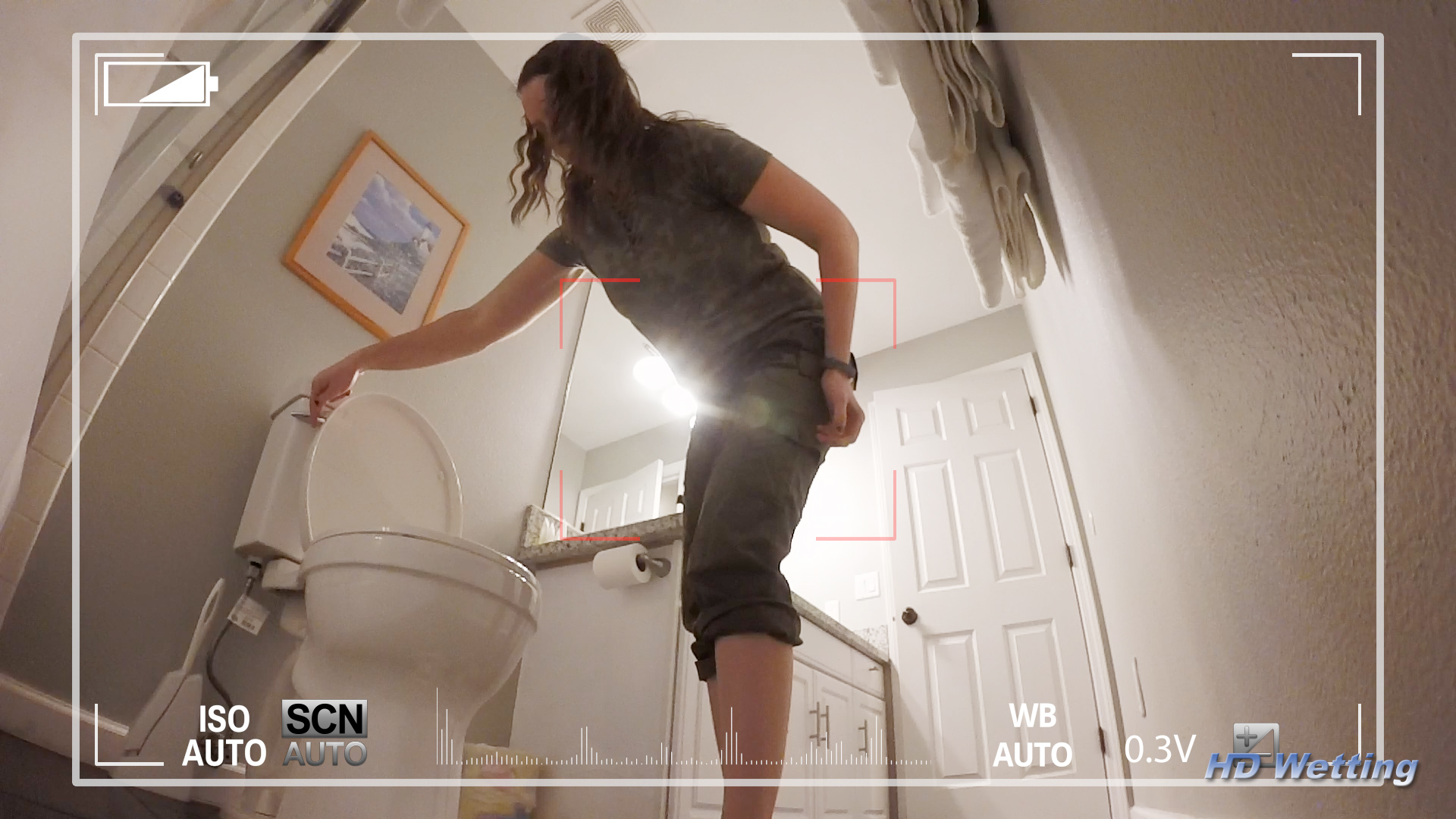 spy-5 We get a clearer look at her wet pants as she stands up from the toilet.