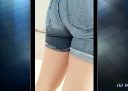 Rear view of Alisha's wet denim shorts.