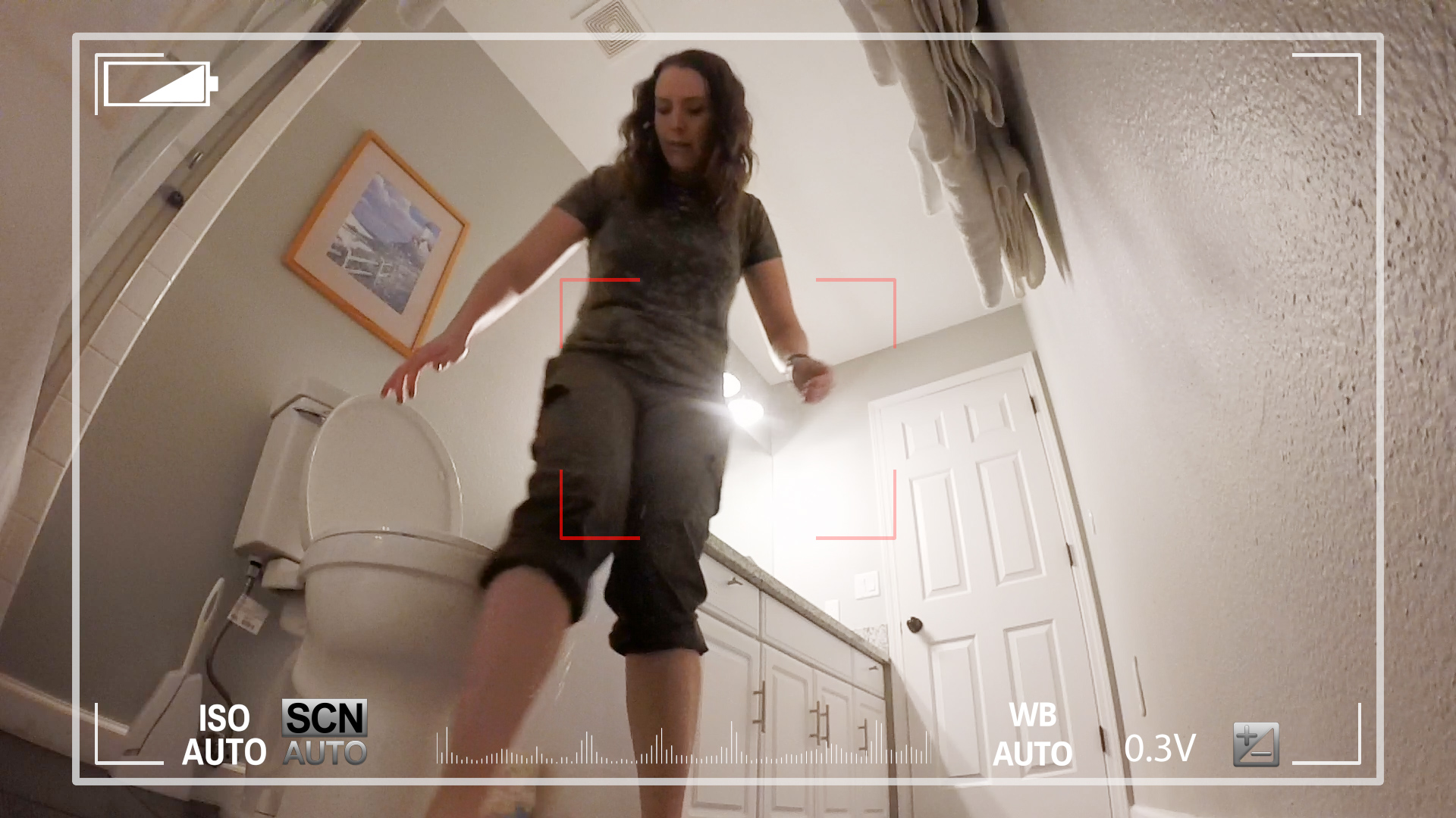 vid_897 Drops are visible falling from Alisha's pants just in front of the toilet.