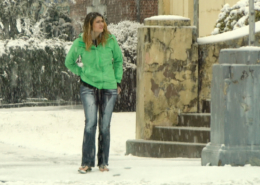 Sosha peeing in her jeans on a public street.