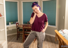 Wearing her soaked cargo pants, Olivia smiles at the camera.