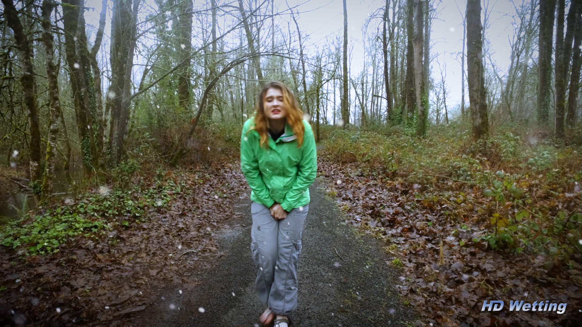 snow-1 Wearing a green coat and gray pants, Sosha clutches her crotch, desperate to pee.