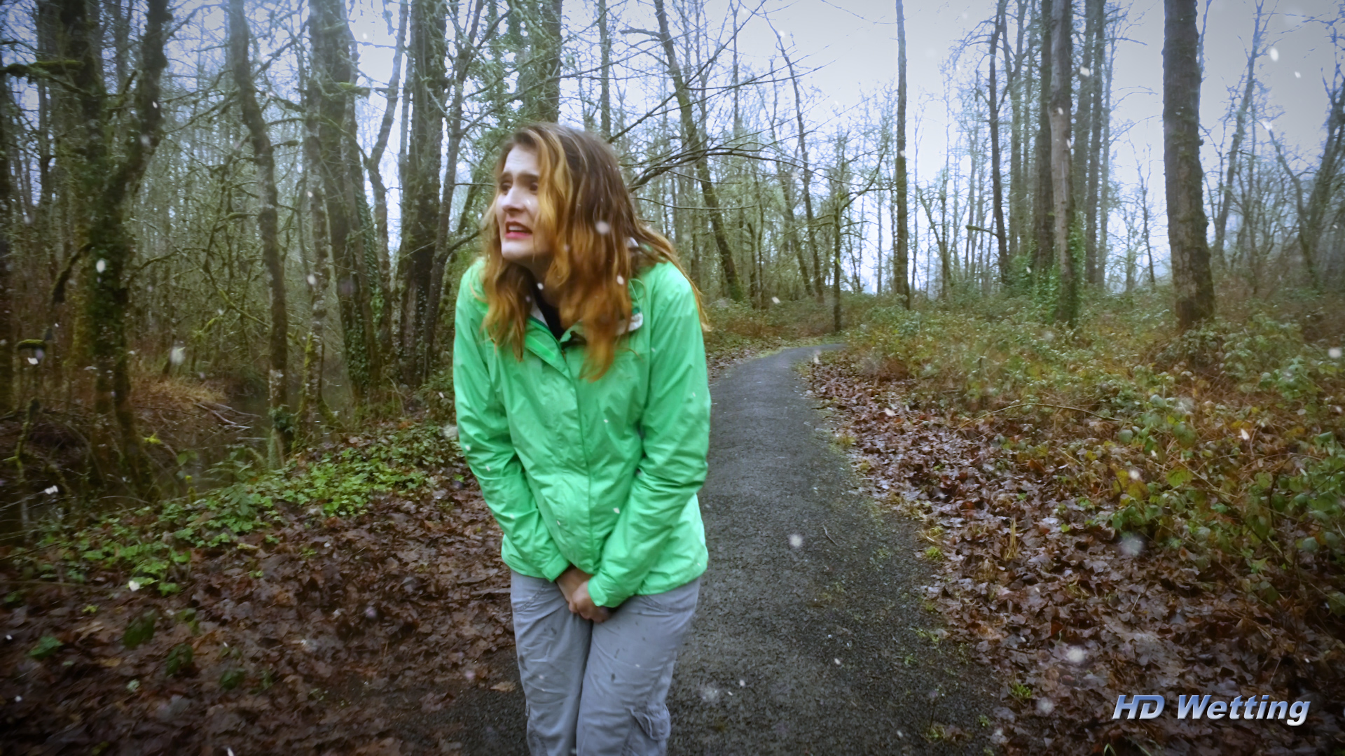 snow-2 Walking through the woods in a snowstorm, Sosha tightly holds her crotch.