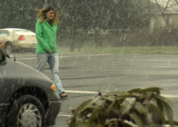 While crossing the street and wetting her pants, Sosha almost gets hit by a car.