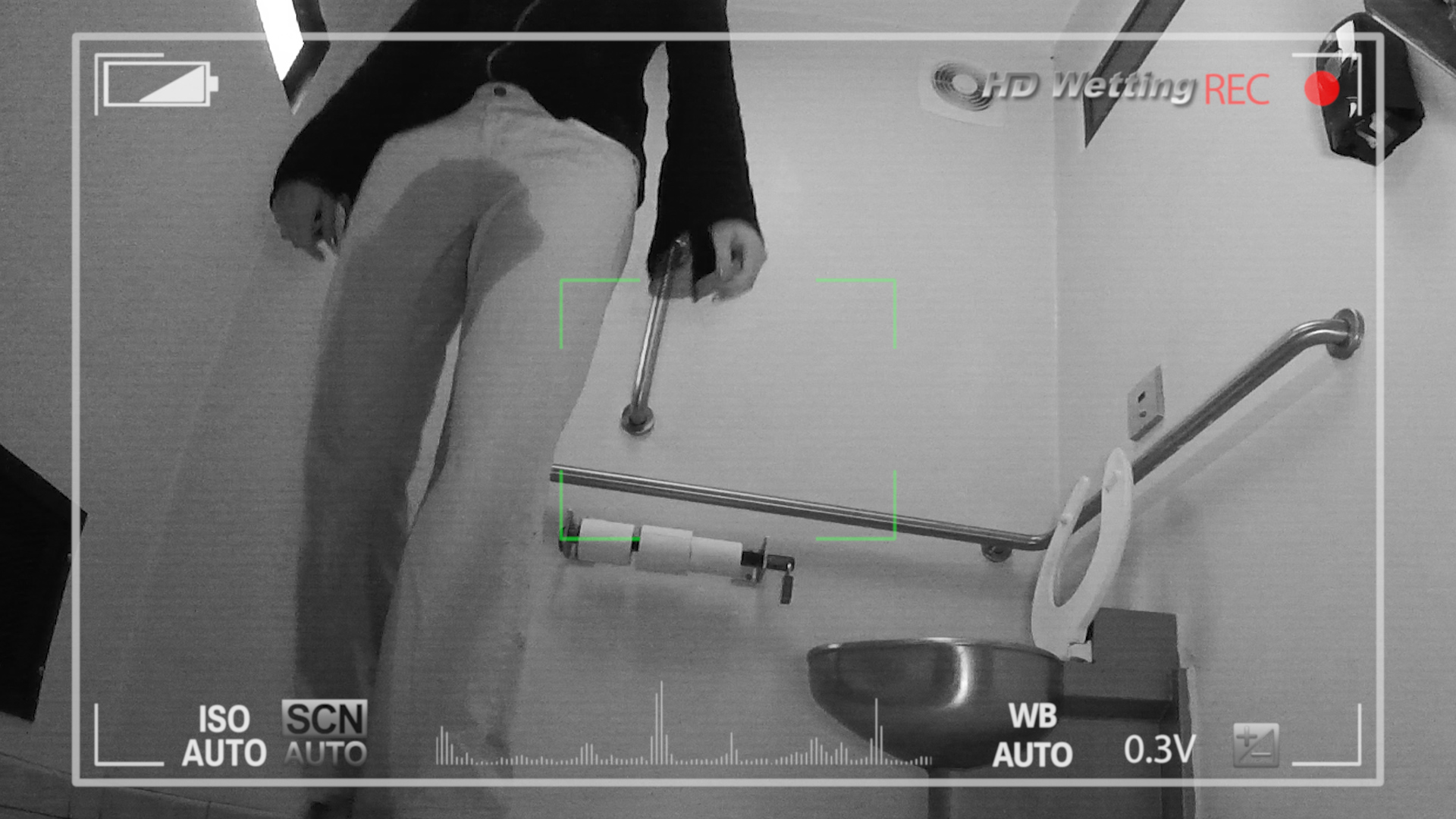 accident-6 Walking past the camera as she leaves the bathroom gives us a close-up view of her wet pants.
