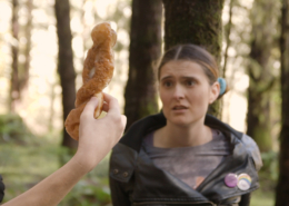 Sosha stares longingly at the donut in Olivia's hand.